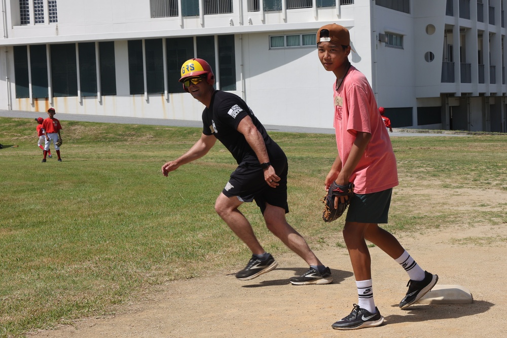 HMLA-169 Marines play baseball with local youth baseball team