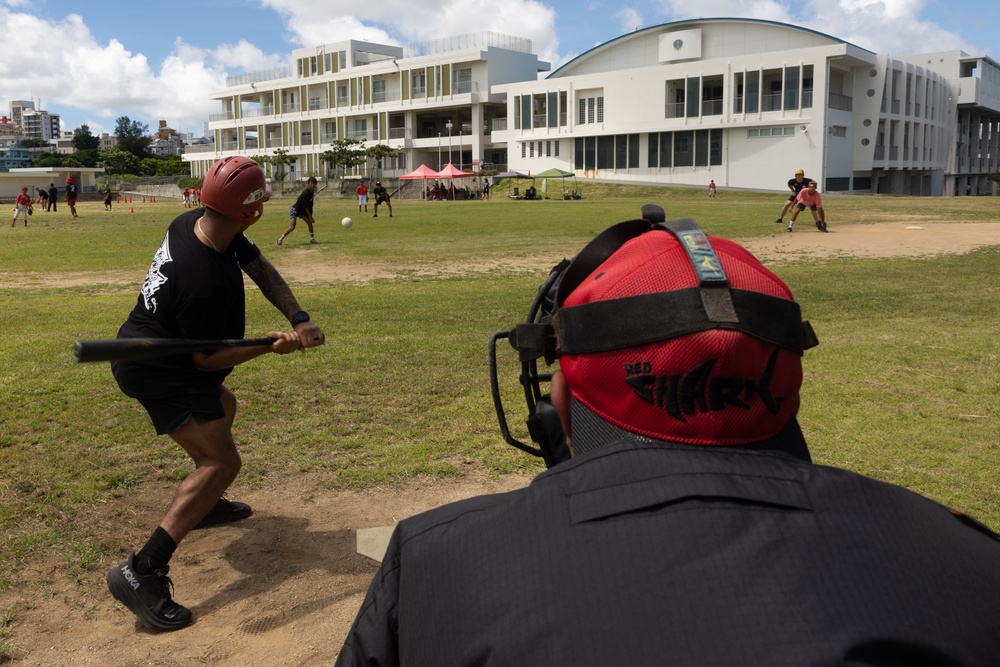 HMLA-169 Marines play baseball with local youth baseball team