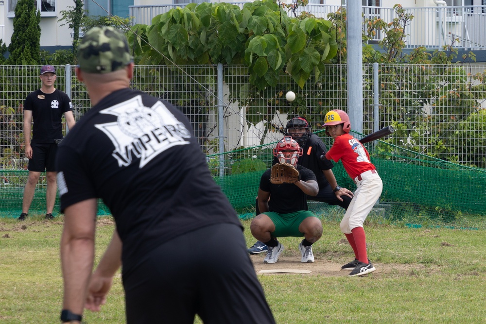 HMLA-169 Marines play baseball with local youth baseball team
