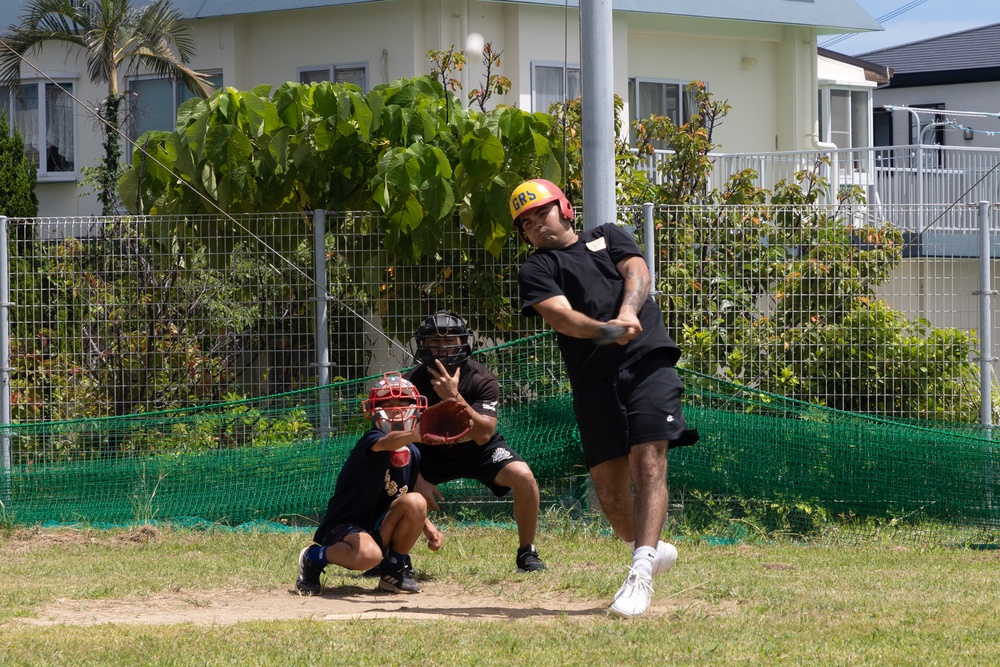 HMLA-169 Marines play baseball with local youth baseball team