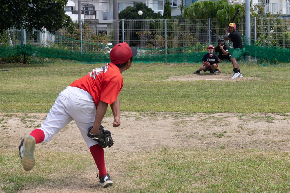 HMLA-169 Marines play baseball with local youth baseball team