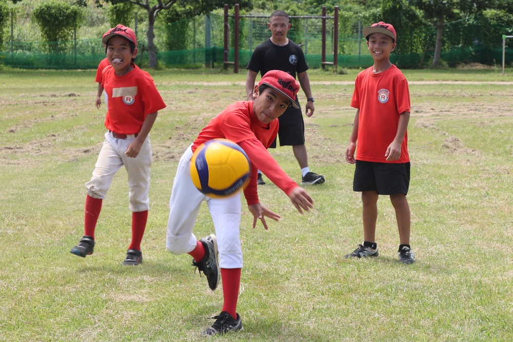 HMLA-169 Marines play baseball with local youth baseball team