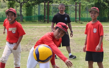 HMLA-169 Marines play baseball with local youth baseball team