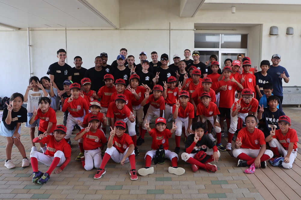 HMLA-169 Marines play baseball with local youth baseball team