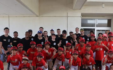 HMLA-169 Marines play baseball with local youth baseball team