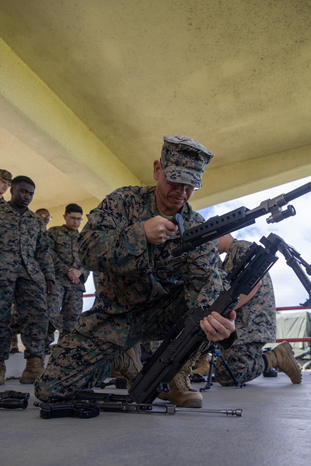 2nd Lt. Jackson teaches MWHS-1 Marines about M240B machine gun