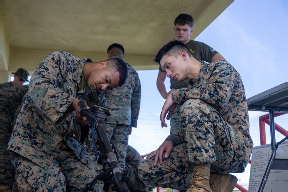 2nd Lt. Jackson teaches MWHS-1 Marines about M240B machine gun