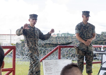 2nd Lt. Jackson teaches MWHS-1 Marines about M240B machine gun