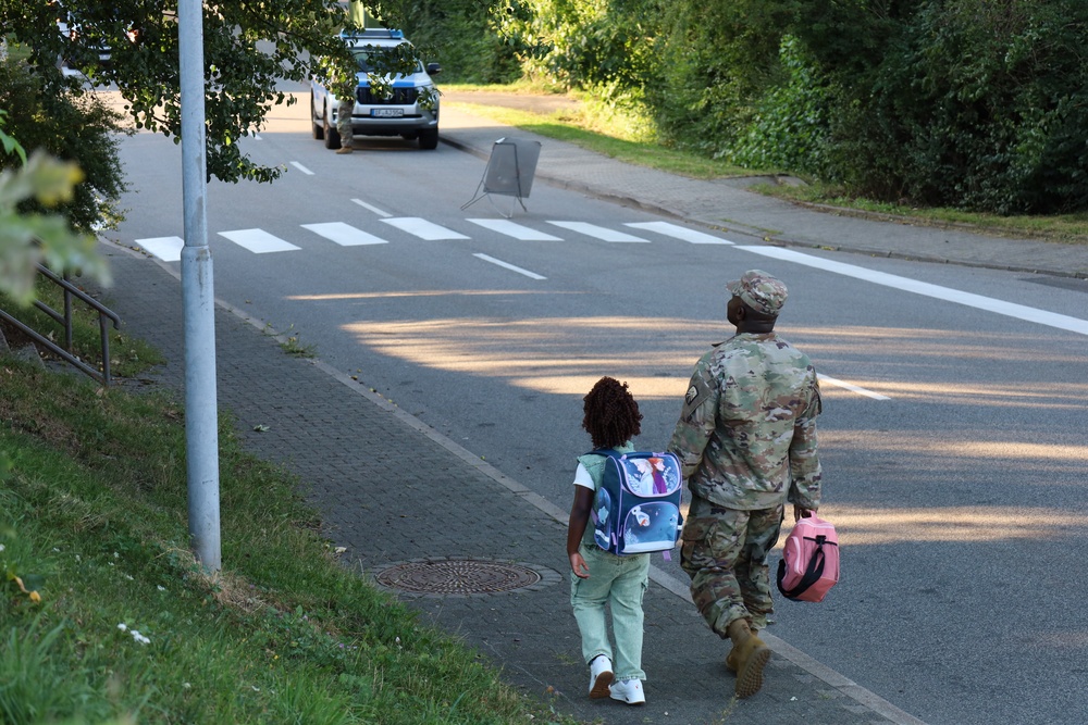 Soldiers walk their kids to school the first school day of 2025