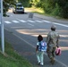 Soldiers walk their kids to school the first school day of 2025