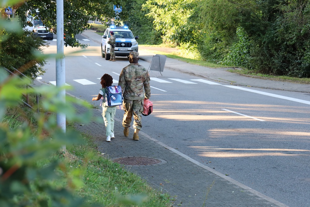Soldiers walk their kids to school the first school day of 2025
