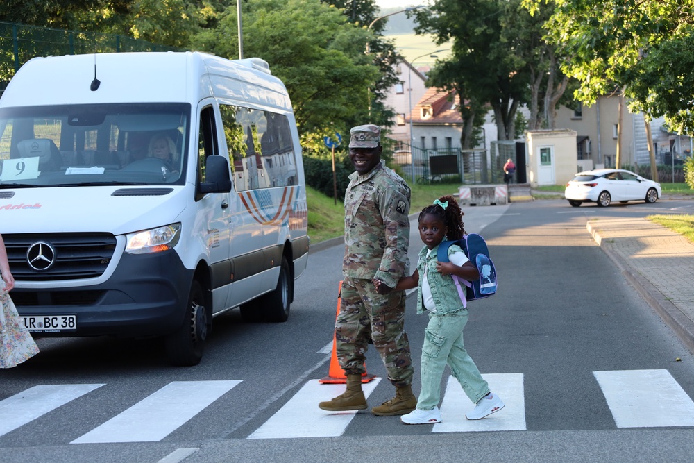 Soldiers walk their kids to school the first school day of 2025
