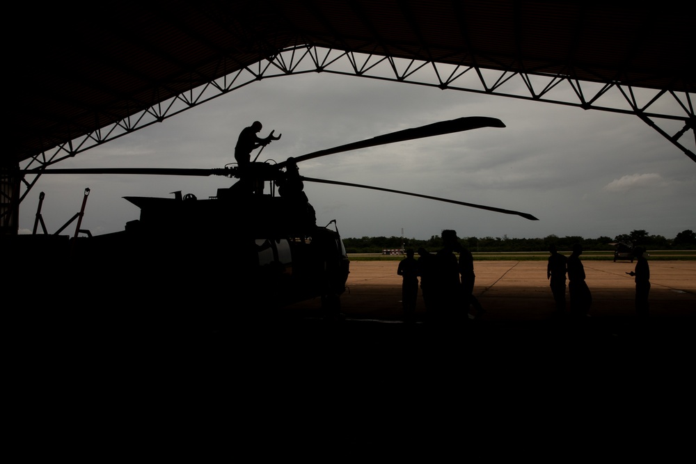 Air Mobility. Some assembly required: Washington National guard soldiers work to prepare Blackhawks for flight.