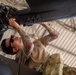 Air Mobility. Some assembly required: Washington National guard soldiers work to prepare Blackhawks for flight.