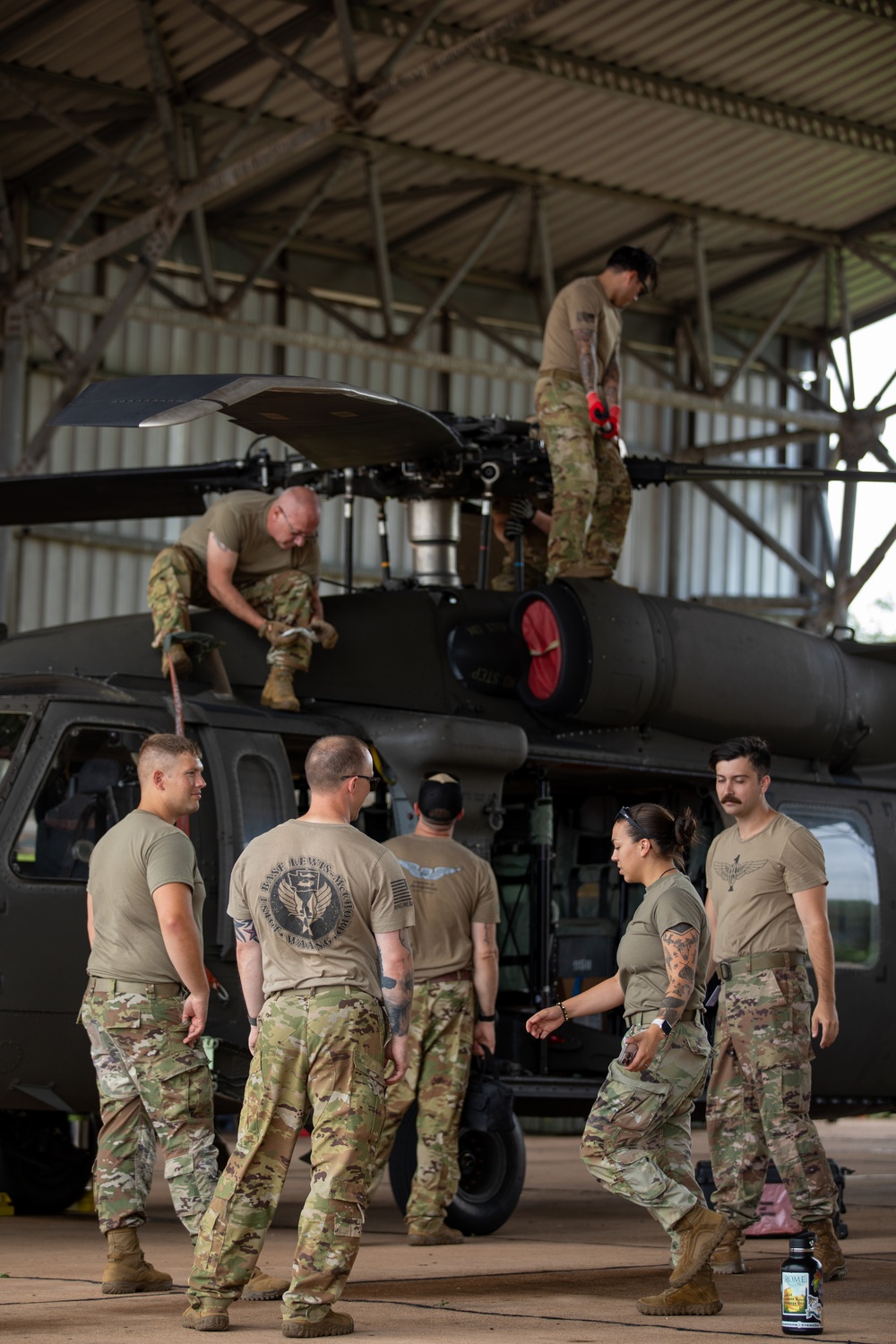 Air Mobility. Some assembly required: Washington National guard soldiers work to prepare Blackhawks for flight.