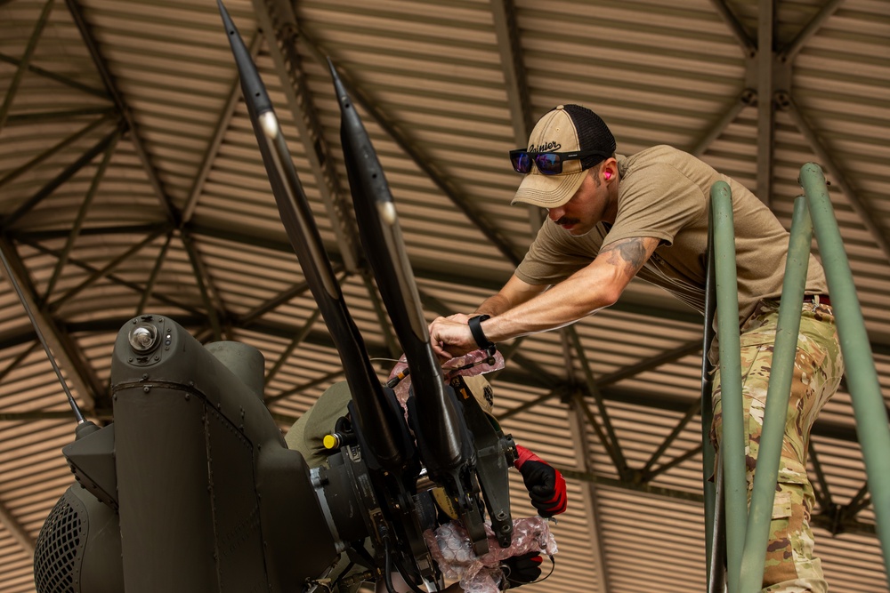 Air Mobility. Some assembly required: Washington National guard soldiers work to prepare Blackhawks for flight.