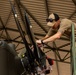 Air Mobility. Some assembly required: Washington National guard soldiers work to prepare Blackhawks for flight.