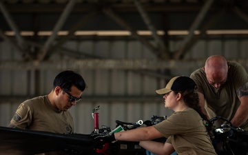 Air Mobility. Some assembly required: Washington National guard soldiers work to prepare Blackhawks for flight.