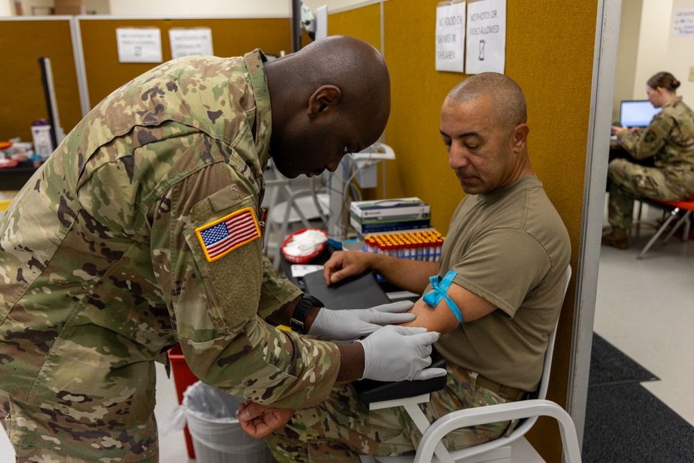 Soldier Extracts Blood