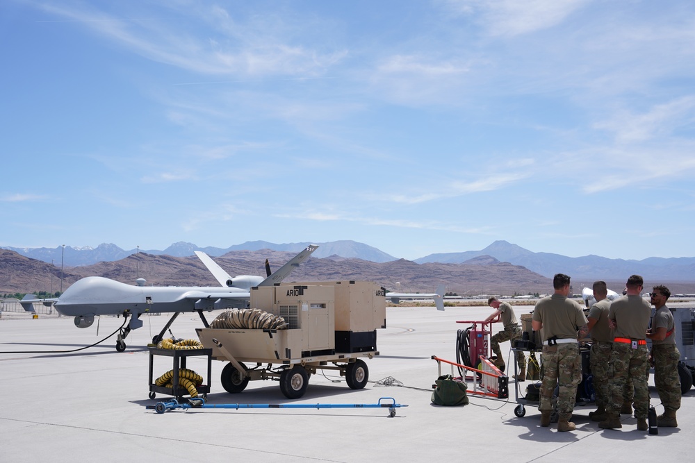 432nd AMXS crew chiefs service MQ-9 Reaper