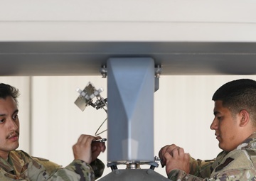432nd AMXS maintenance professionals service MQ-9 Reaper