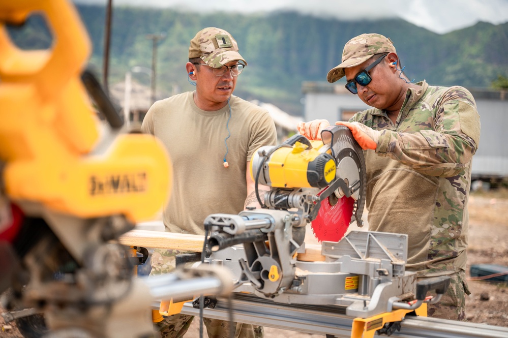 Airmen Cutting Wood for Foundation