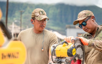 Airmen Cutting Wood for Foundation