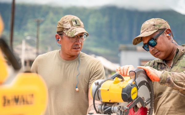 Airmen Cutting Wood for Foundation