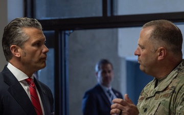 Secretary of Defense speaks with service members at JBER