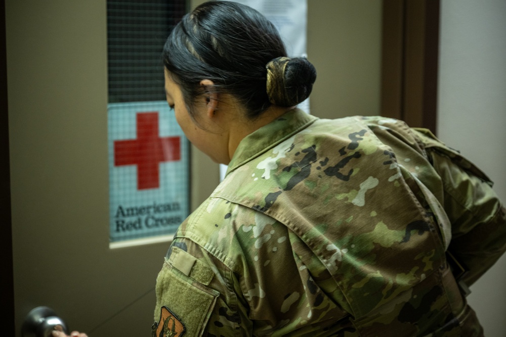 Forging a Legacy of Service: 349th Reserve Airman's Triple Triumph