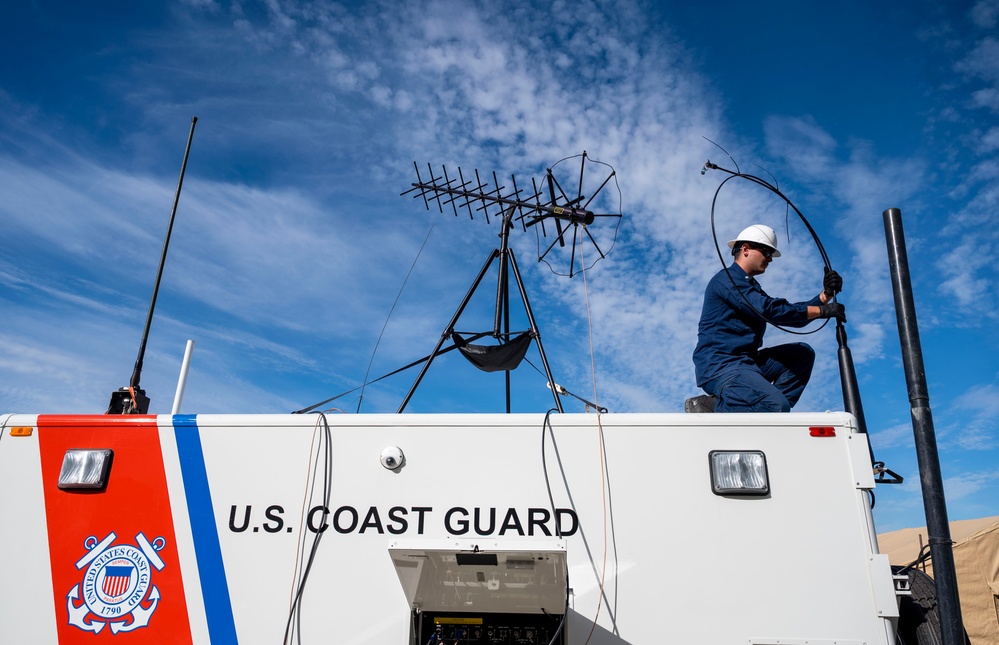 U.S. Coast Guardsmen provide communications support during AE25