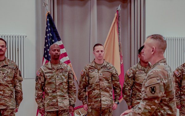 21st TSC Commander Presents medals to 16th Sustainment Brigade Soldiers