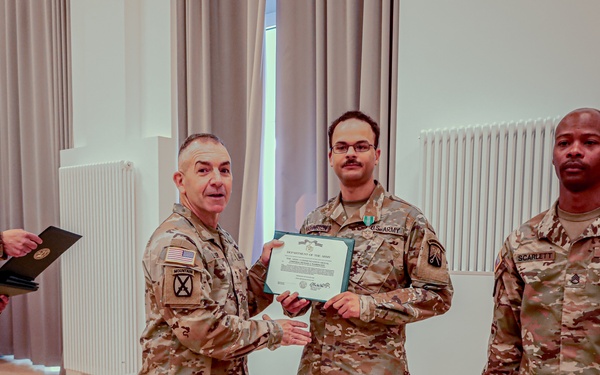 21st TSC Commander Presents medals to 16th Sustainment Brigade Soldiers