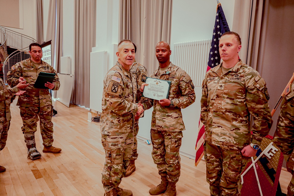 21st TSC Commander Presents Army medals to 16th Sustainment Brigade Soldier's