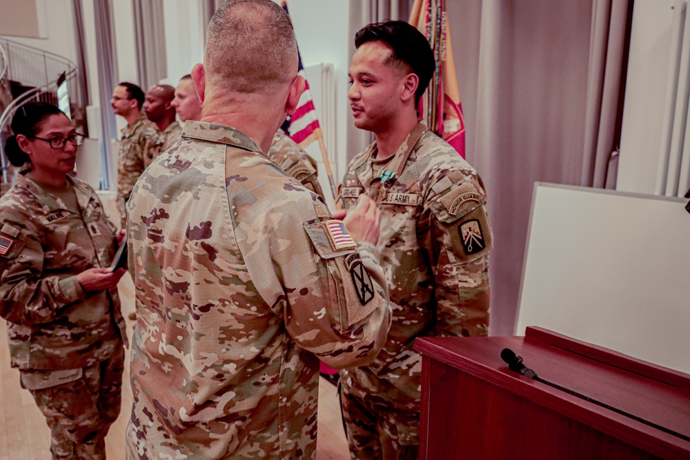 21st TSC Commander Presents Army medals to 16th Sustainment Brigade Soldier's