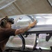 VFA-213 Sailor Cleans Aircraft