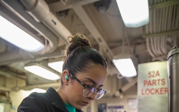 USS Gerald R. Ford (CVN 78) Sailor Conducts Maintenance