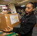 USS Gerald R. Ford (CVN 78) Sailor Processes Mail