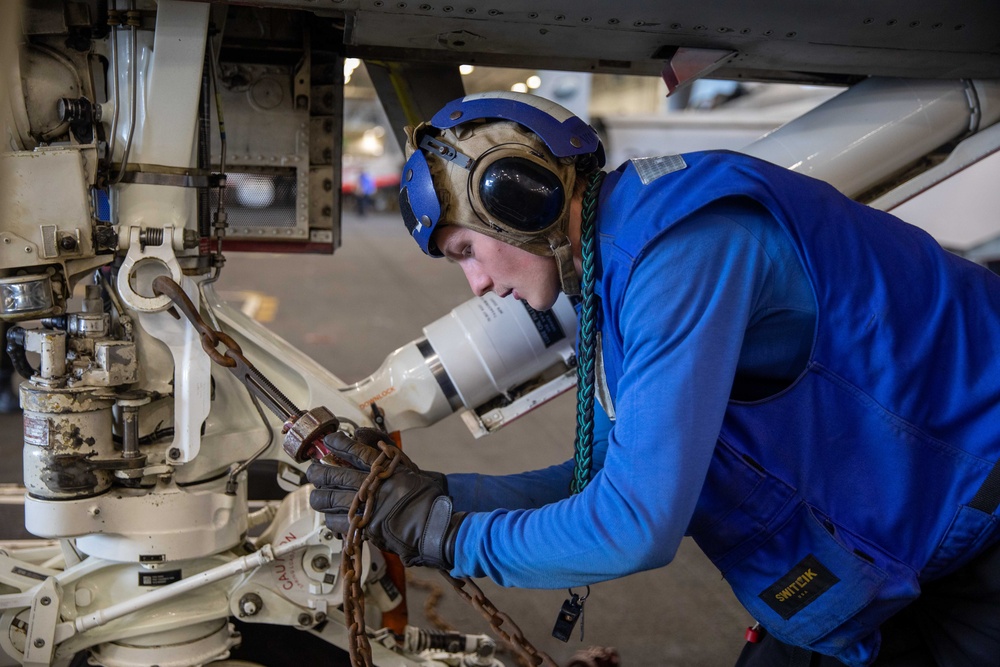 USS Gerald R. Ford (CVN 78) Sailor Secures Aircraft