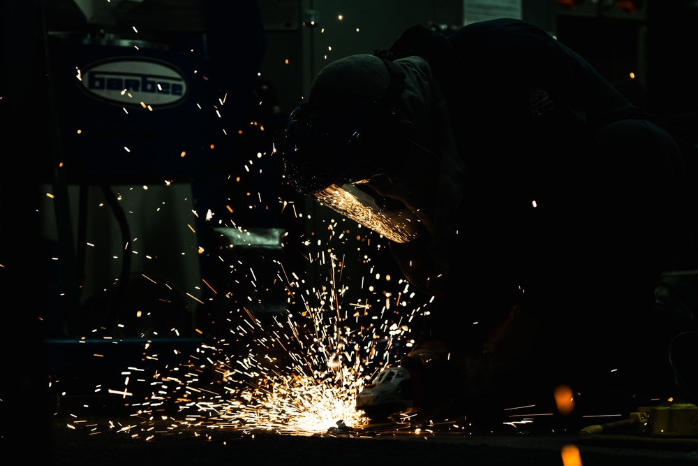 USS Gerald R. Ford (CVN 78) Sailor Conducts Space Restoration