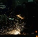 USS Gerald R. Ford (CVN 78) Sailor Conducts Space Restoration