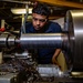 USS Gerald R. Ford (CVN 78) Sailor Operates Lathe