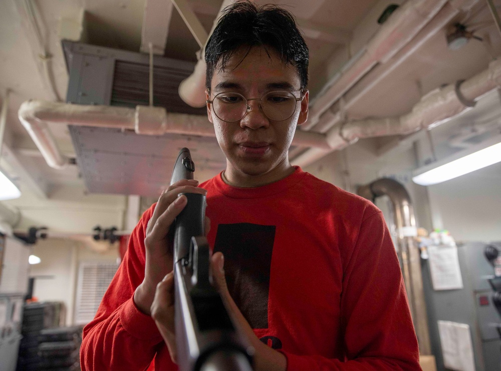 George Washington Sailor Conducts Weapon Checks