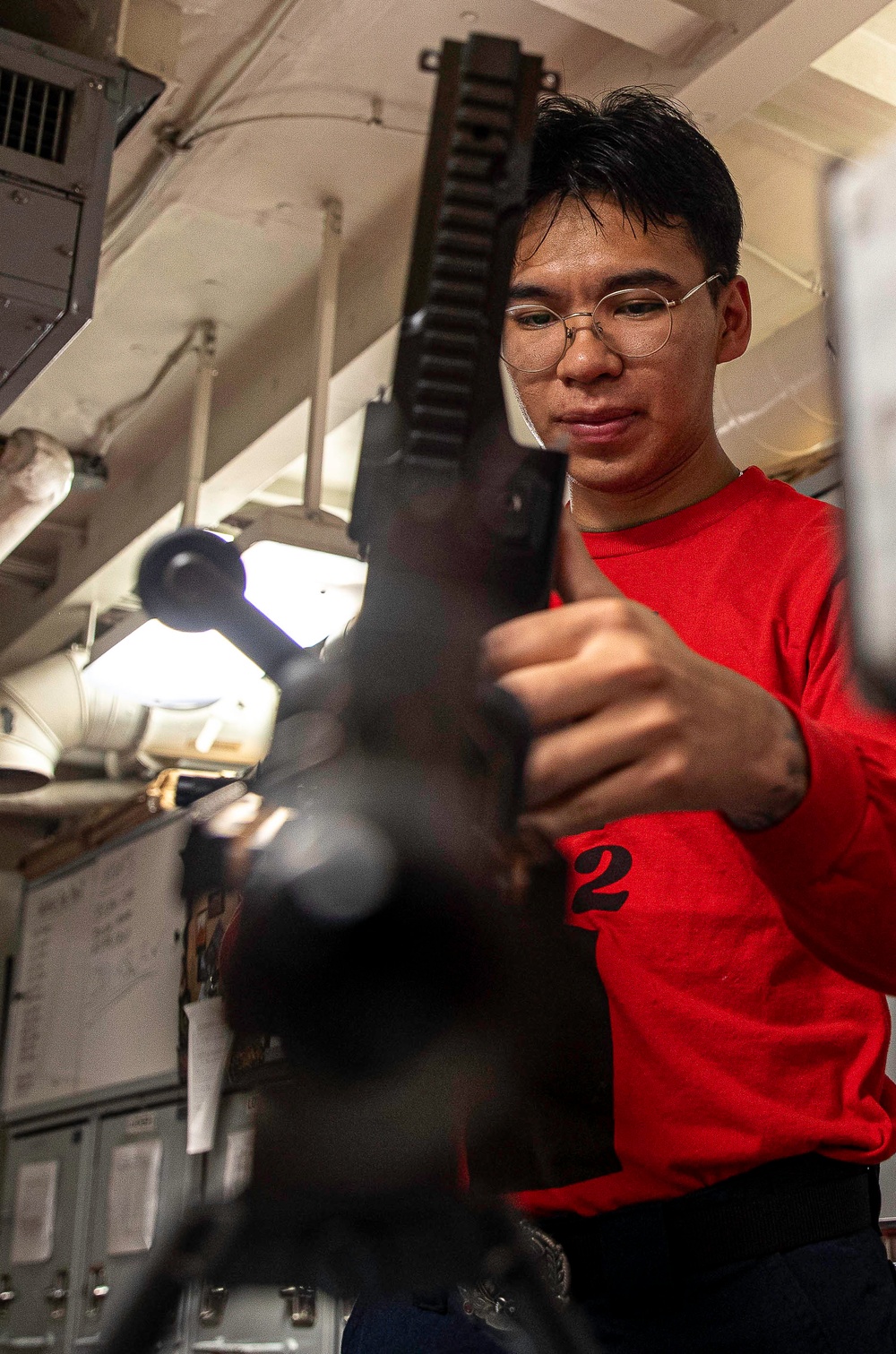 George Washington Sailor Conducts Weapon Checks