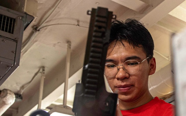 George Washington Sailor Conducts Weapon Checks