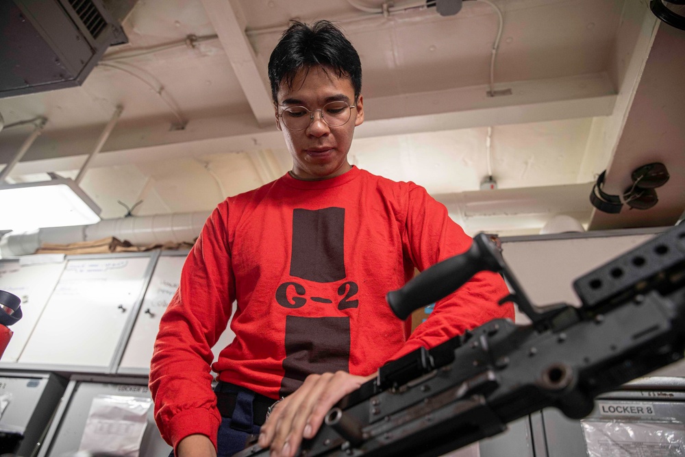 George Washington Sailor Conducts Weapon Checks
