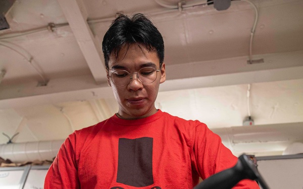 George Washington Sailor Conducts Weapon Checks