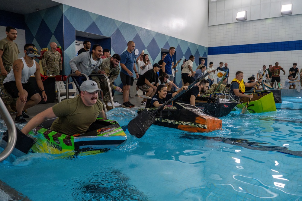 Sink or win: 22nd OSS flights compete in cardboard boat race