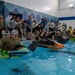 Sink or win: 22nd OSS flights compete in cardboard boat race