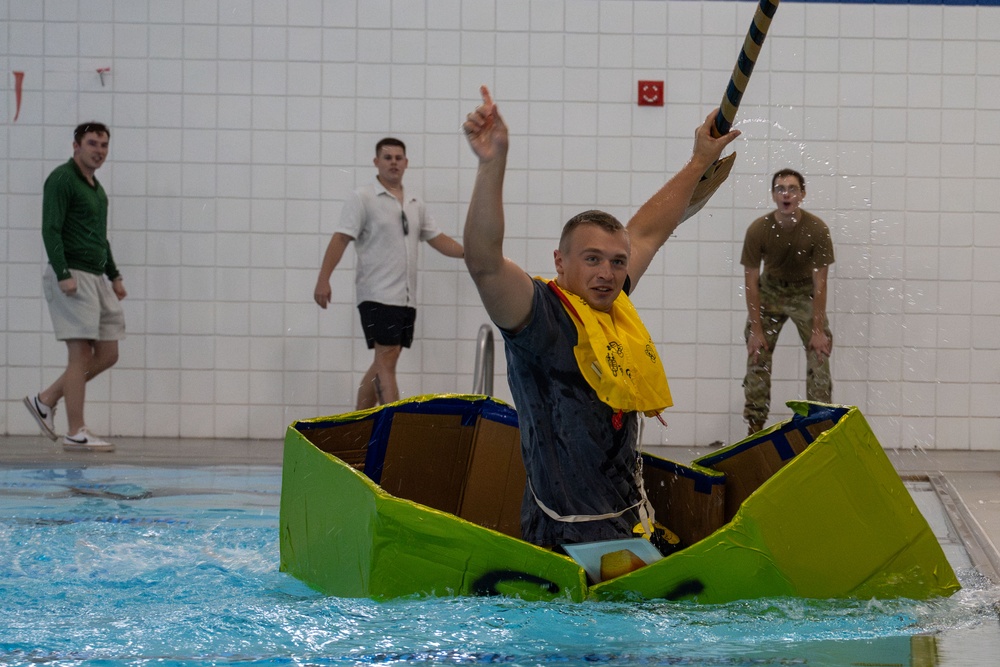 Sink or win: 22nd OSS flights compete in cardboard boat race